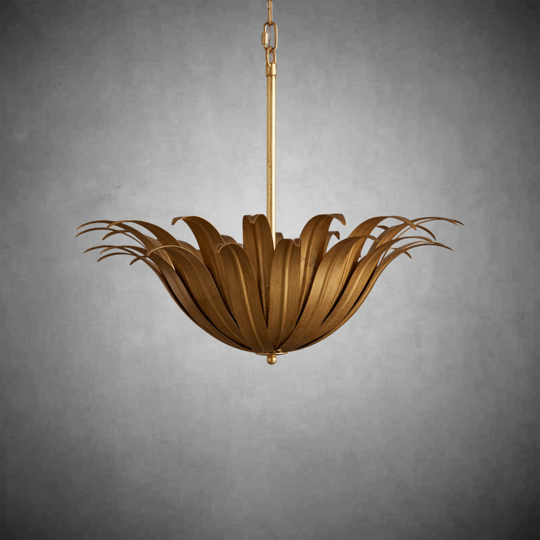 Matilde Pendant with antique-gold finish, features layered petal-like iron design. Hangs from a chain and rod, providing an elegant look.