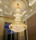 https://cdn.shopify.com/s/files/1/0735/1009/3113/products/LuxuryExtraLargeRoundCeilingLightingFixtureStatelyCrystalChandelierForFoyerStaircase.jpg?v=1709698304