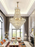 https://cdn.shopify.com/s/files/1/0736/8795/7790/files/foyer-staircase-chandelier-luxury-k9-crystal-ceiling-light-for-living-room-hallway-merlin-lamps-4.jpg?v=1765361004