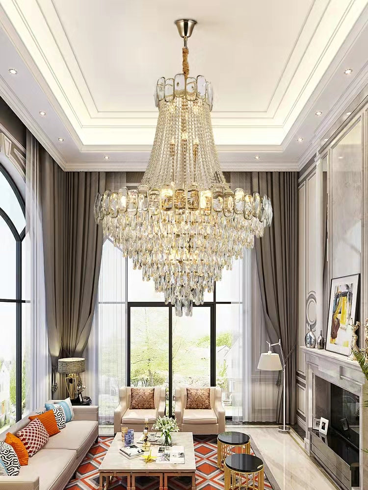 https://cdn.shopify.com/s/files/1/0736/8795/7790/files/foyer-staircase-chandelier-luxury-k9-crystal-ceiling-light-for-living-room-hallway-merlin-lamps-4.jpg?v=1765361004
