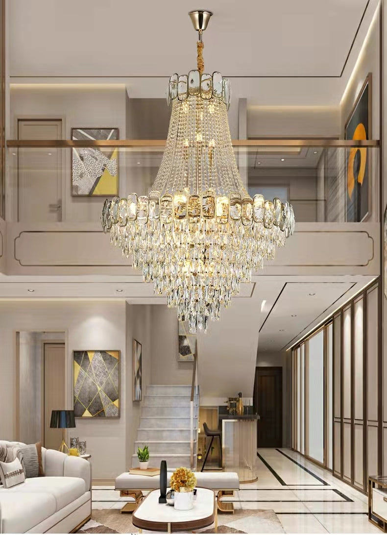 https://cdn.shopify.com/s/files/1/0736/8795/7790/files/foyer-staircase-chandelier-luxury-k9-crystal-ceiling-light-for-living-room-hallway-merlin-lamps-5.jpg?v=1765361006