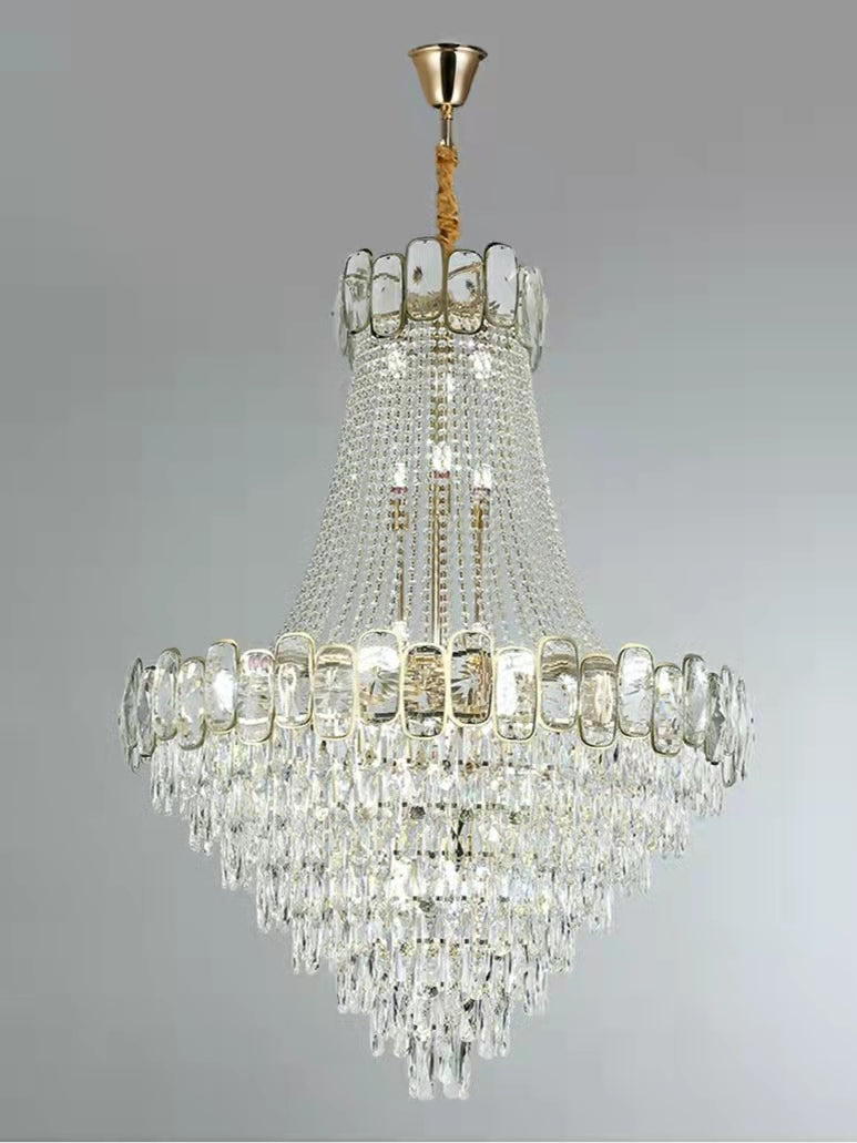 https://cdn.shopify.com/s/files/1/0736/8795/7790/files/foyer-staircase-chandelier-luxury-k9-crystal-ceiling-light-for-living-room-hallway-merlin-lamps-9.jpg?v=1765361011